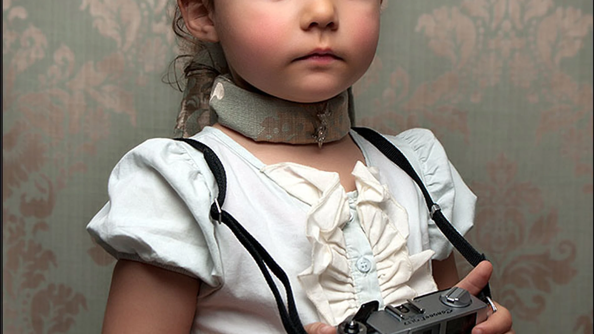 Athena con una cámara de fotos Athena con una cámara de fotos