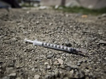 Una jeringuilla Una jeringuilla