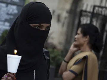 Una mujer india durante una protesta contra la oleada de violaciones en la India. Una mujer india durante una protesta contra la oleada de violaciones en la India.