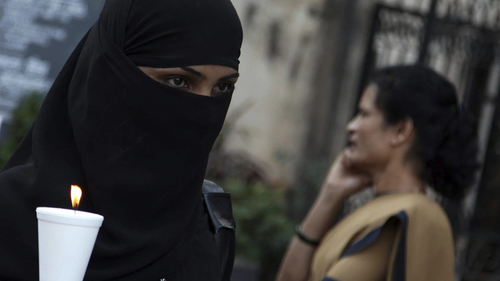 Una mujer india durante una protesta contra la oleada de violaciones en la India. Una mujer india durante una protesta contra la oleada de violaciones en la India.