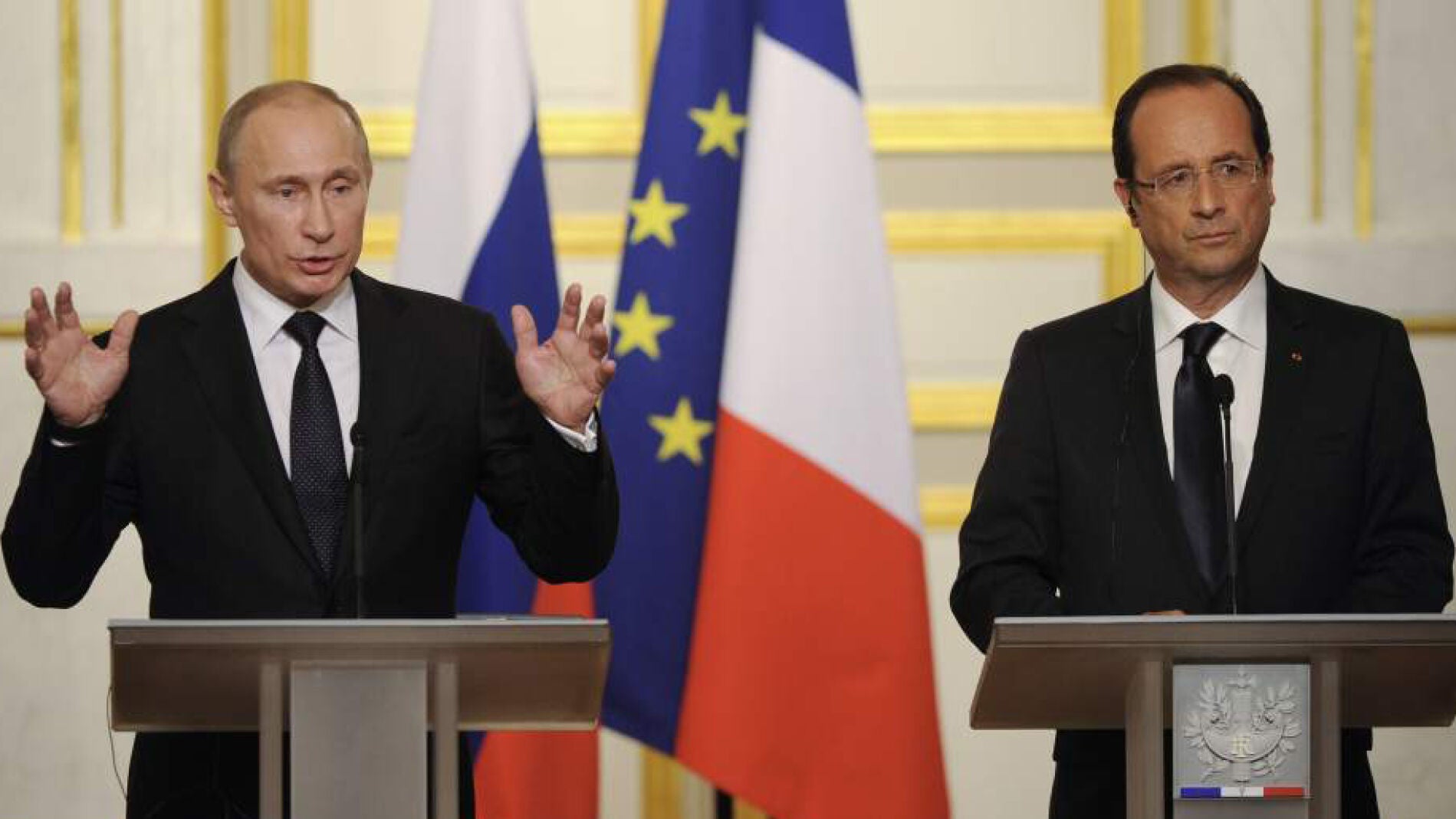 Vlad&iacute;mir Putin y Fran&ccedil;ois Hollande en una rueda de prensa conjunta