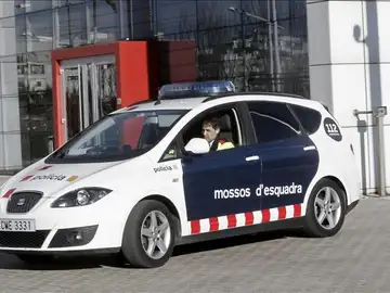 Un coche de los Mossos d'Esquadra en un suceso Un coche de los Mossos d'Esquadra en un suceso