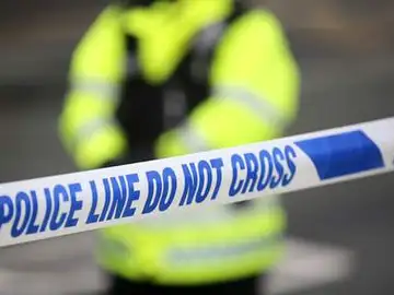 Imagen de archivo de un cordón policial Imagen de archivo de un cordón policial