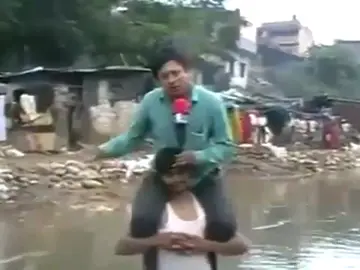 Un reportero indio 'a cabellito' Un reportero indio 'a cabellito'