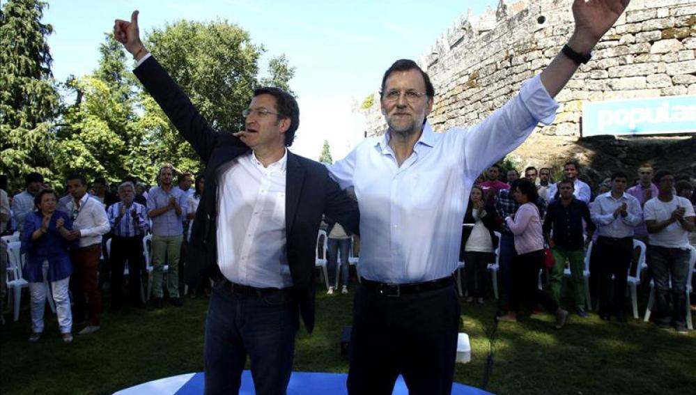 Mariano Rajoy y Alberto Núñez Feijóo, durante el acto celebrado hace un año