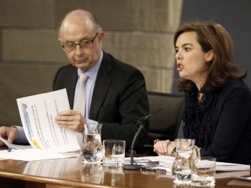 Cristóbal Montoro junto a Soraya Sáenz de Santamaría