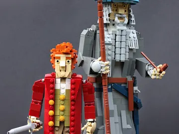 Gandalf el Gris con capa, sobrero y pipa, junto a su amigo y compañero Bilbo Bolsón Gandalf el Gris con capa, sobrero y pipa, junto a su amigo y compañero Bilbo Bolsón