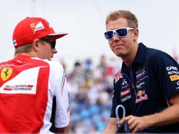 Vettel, junto a Raikkonen