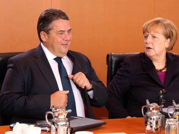 Sigmar Gabriel junto a Angela Merkel