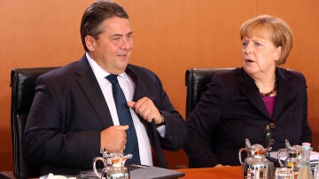 Sigmar Gabriel junto a Angela Merkel