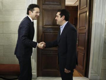 Jeroen Dijsselbloem, con Alexis Tsipras