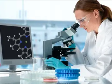 Una investigadora en un laboratorio Una investigadora en un laboratorio
