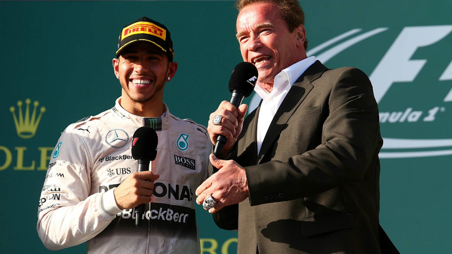 Hamilton y Schwarzenegger, en el podio de Australia 