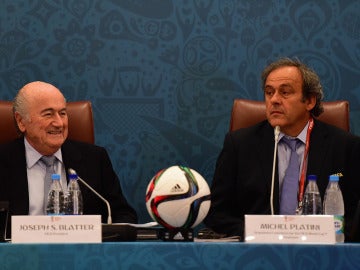 Platini y Blatter durante un seminario