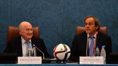 Platini y Blatter durante un seminario
