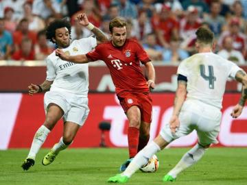Götze chuta a portería ante el Madrid Götze chuta a portería ante el Madrid