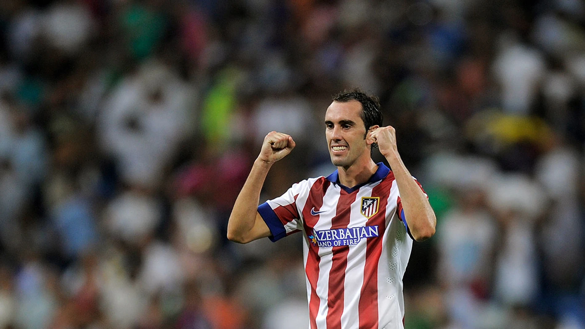 Godín celebra un gol con el Atlético Godín celebra un gol con el Atlético