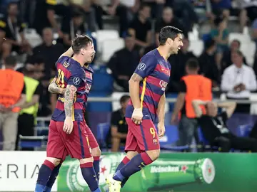 Messi, con Luis Suárez Messi, con Luis Suárez
