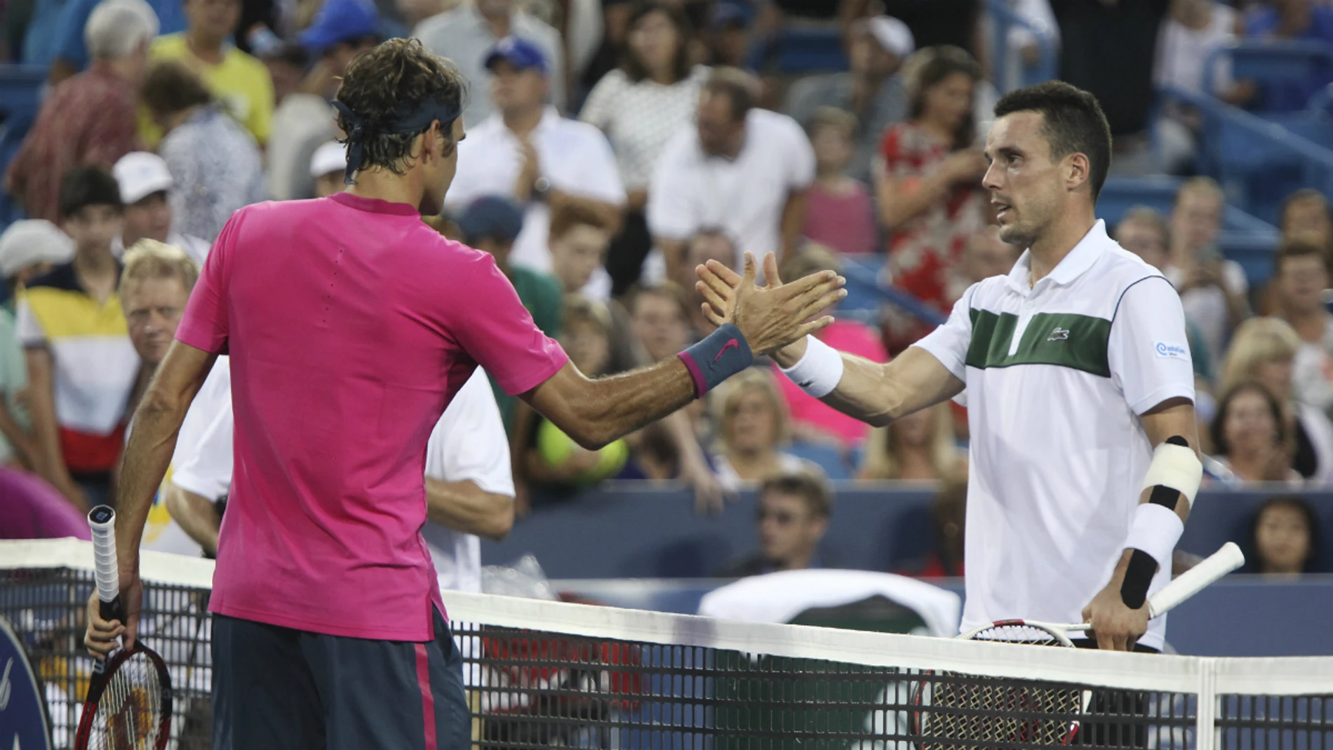 Roger Federer y Roberto Bautista, tras acabar su partido Roger Federer y Roberto Bautista, tras acabar su partido