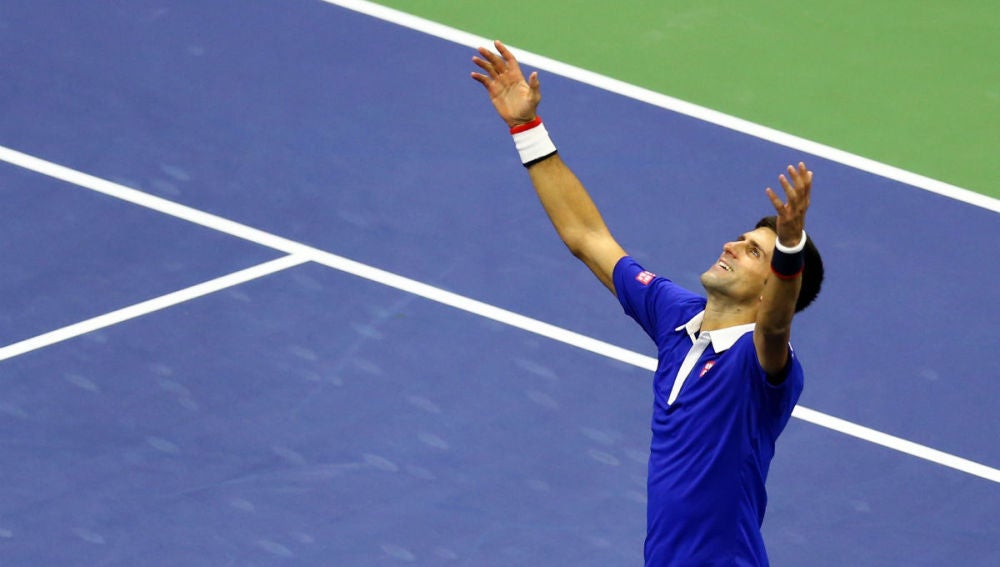 Djokovic celebra su victoria ante Federer