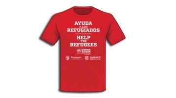 Camiseta solidaria que se lució en el Atlético - Barcelona