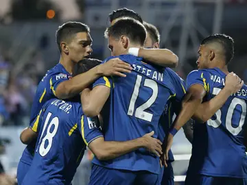 Los jugadores del Getafe celebran el gol de Scepovic contra el Málaga Los jugadores del Getafe celebran el gol de Scepovic contra el Málaga