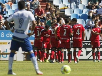 Los jugadores de Osasuna celebran su victoria ante el Zaragoza