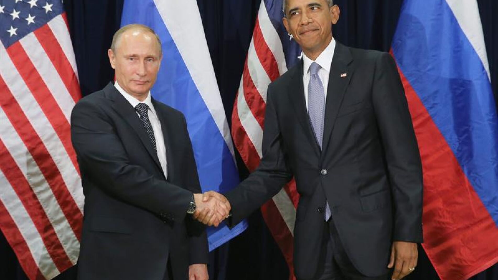 Vladimir Putin saluda a su hom&oacute;logo Barack Obama.
