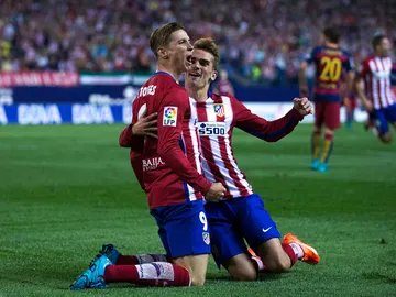Fernando Torres y Griezmann celebrando un gol frente al F.C Barcelona Fernando Torres y Griezmann celebrando un gol frente al F.C Barcelona