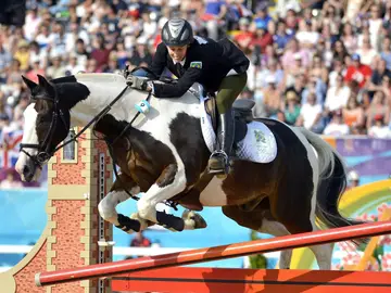 Un jinete y su caballo, durante una prueba Un jinete y su caballo, durante una prueba