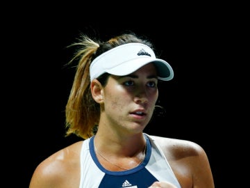 Garbiñe Muguruza celebra un punto durante el partido