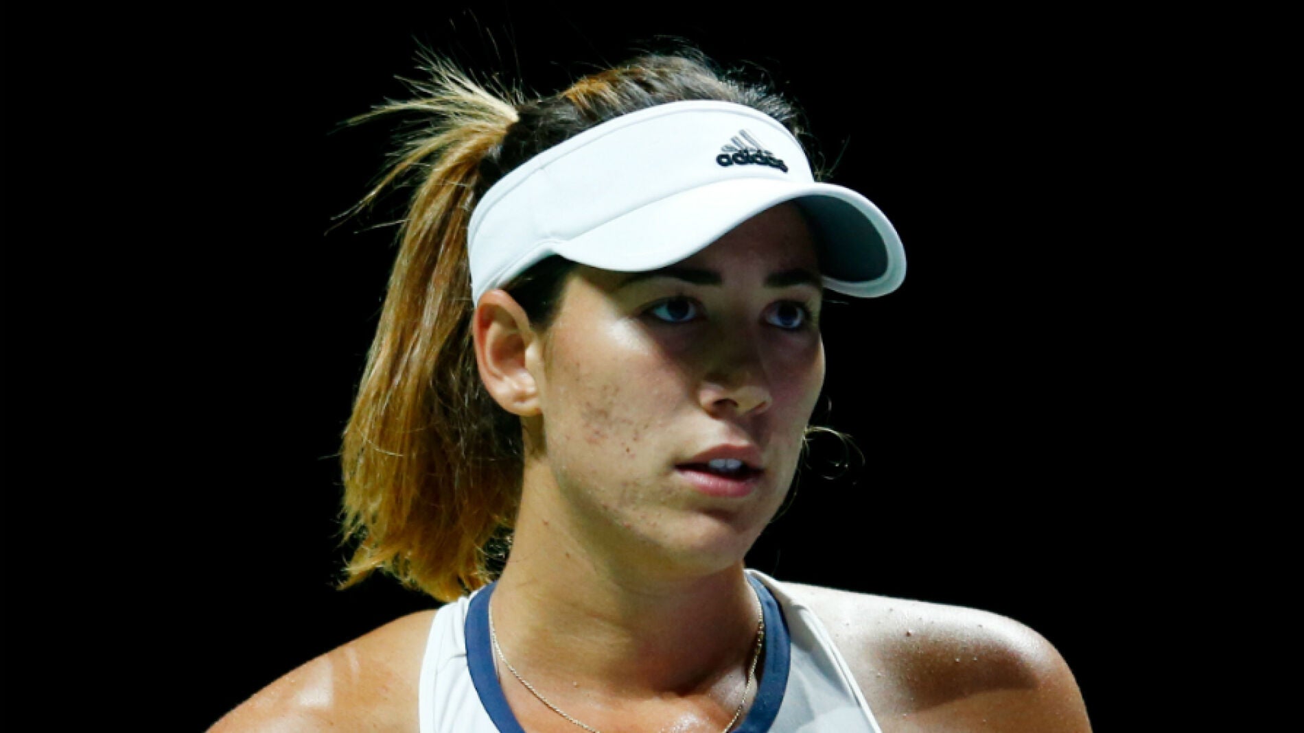 Garbi&ntilde;e Muguruza celebra un punto durante el partido