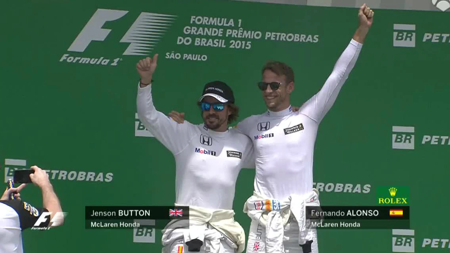 Alonso y Button, en el podio de Interlagos
