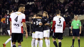Los jugadores del Sevilla celebran su segundo gol contra el Logroño