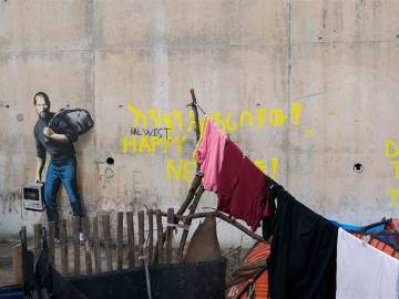 'No todos estamos en el mismo barco', grafiti de Banksy en Calais