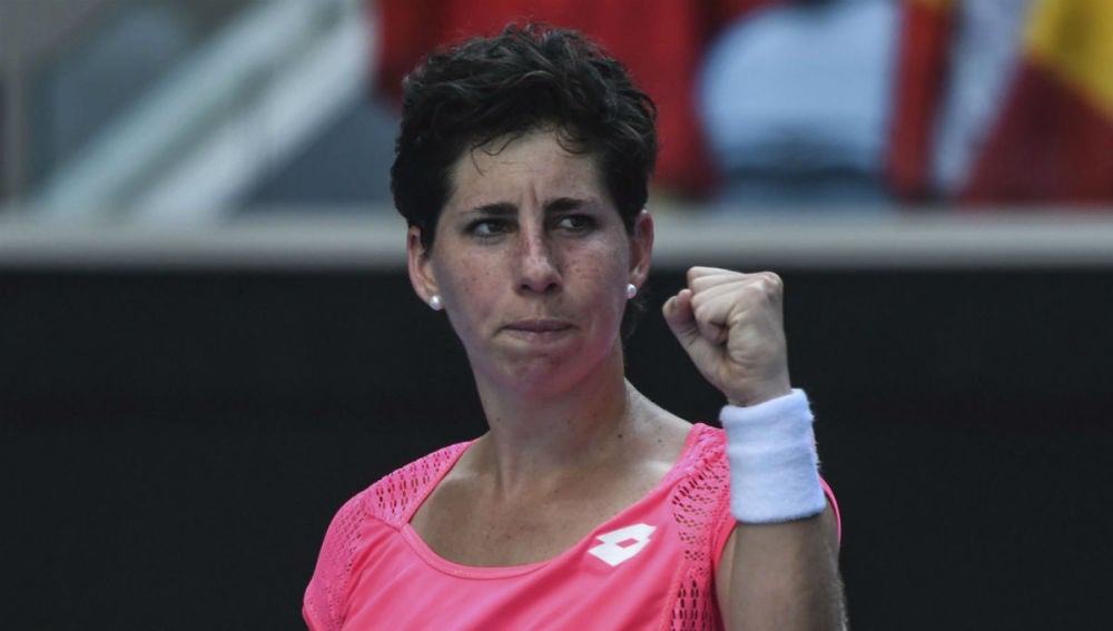 Carla Suárez celebra un punto ante Maria Sakkari