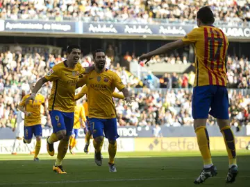 Luis Suárez y Arda festejan un gol con Munir Luis Suárez y Arda festejan un gol con Munir