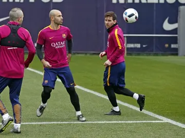 Iniesta, Mascherano y Messi, durante el entrenamiento del Barcelona Iniesta, Mascherano y Messi, durante el entrenamiento del Barcelona