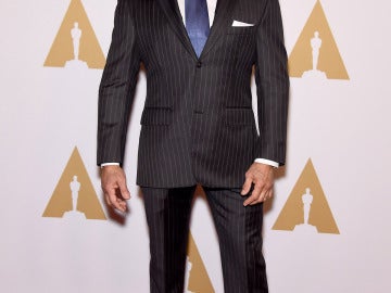 Sylvester Stallone, con traje gris a rayas