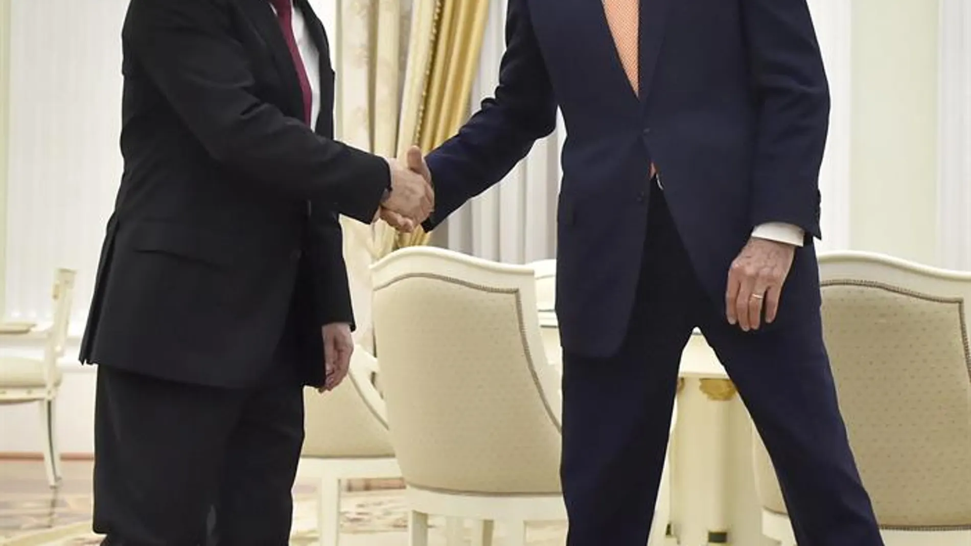 Vladimir Putin y John Kerry durante su encuentro en Rusia Vladimir Putin y John Kerry durante su encuentro en Rusia
