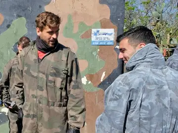 Llorente y Reyes durante la sesión de 'paintball' del Sevilla Llorente y Reyes durante la sesión de 'paintball' del Sevilla