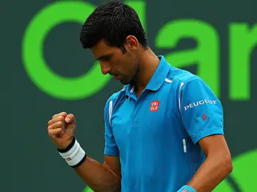 Djokovic celebra su victoria ante Nishikori. Djokovic celebra su victoria ante Nishikori.