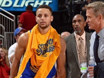 Stephen Curry junto a Steve Kerr