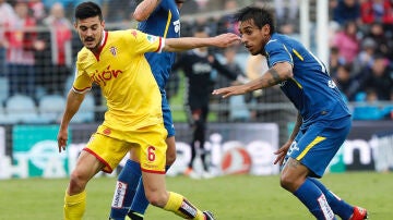 El Getafe y el Sporting durante su empate en la penúltima fecha