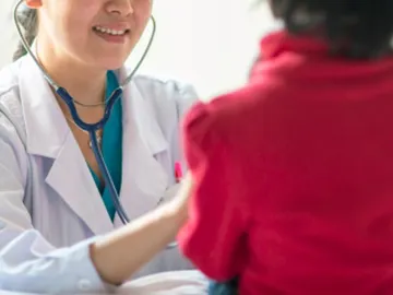 Un niño en una consulta médica Un niño en una consulta médica