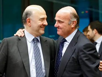 Pierre Moscovici y Luis de Guindos Pierre Moscovici y Luis de Guindos