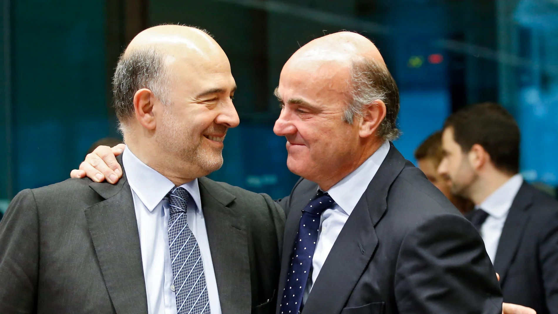 Pierre Moscovici y Luis de Guindos Pierre Moscovici y Luis de Guindos