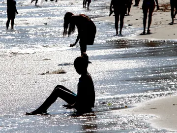 Bañistas en una playa Bañistas en una playa
