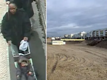 Kabou paseando con su bebé en la playa Kabou paseando con su bebé en la playa