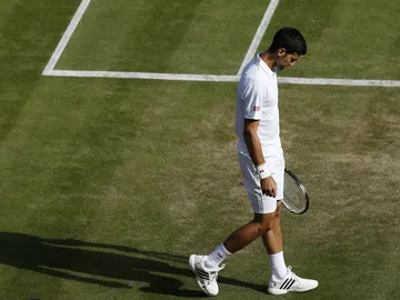 Djokovic, cabizbajo en Wimbledon Djokovic, cabizbajo en Wimbledon